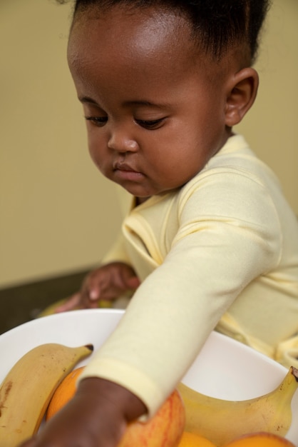 Cute black baby portrait at home