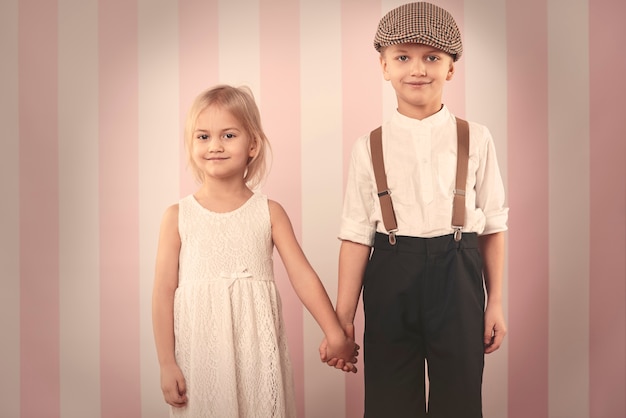 Free photo cute child couple holding hands