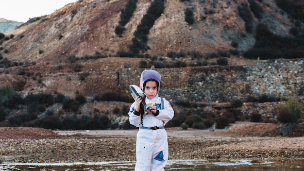 Free photo cute child in spaceman suit