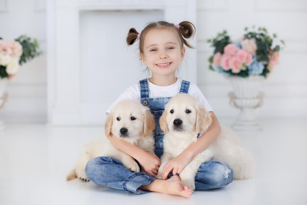 cute child with puppies dog