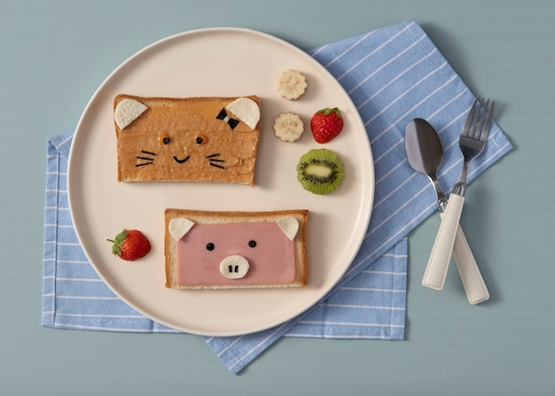 Cute children food on plate flat lay