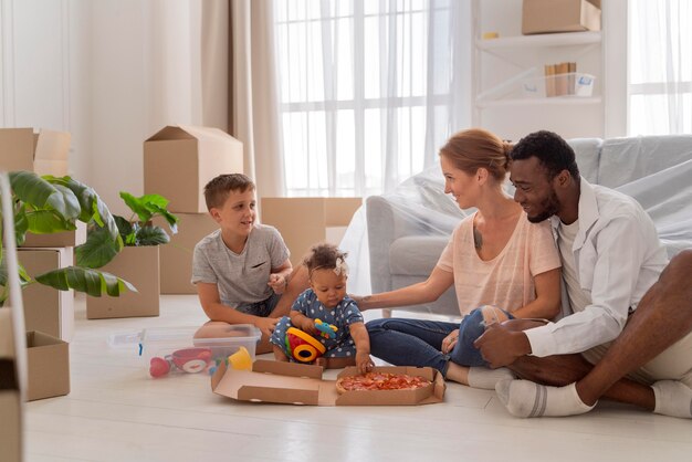 Cute couple getting ready to move with their children