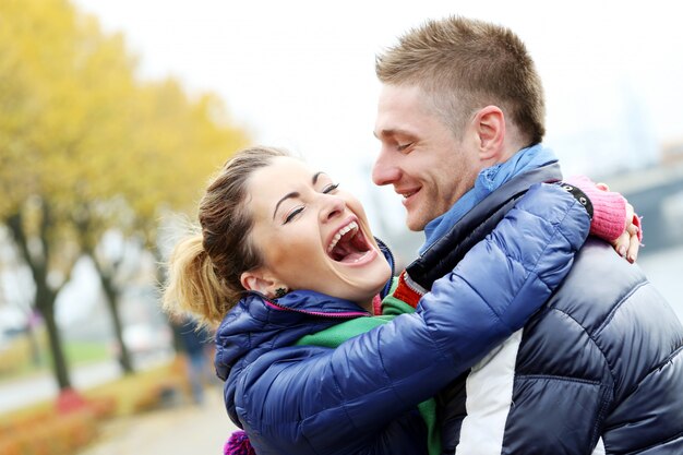 Cute couple having a good time outside