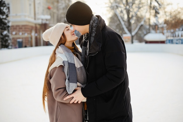 Cute couple in a ice arena