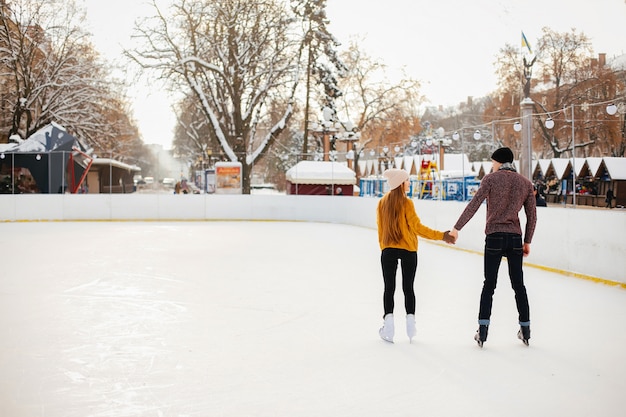 Cute couple in a ice arena