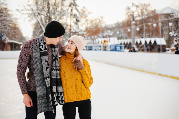 Cute couple in a ice arena