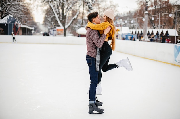 Cute couple in a ice arena