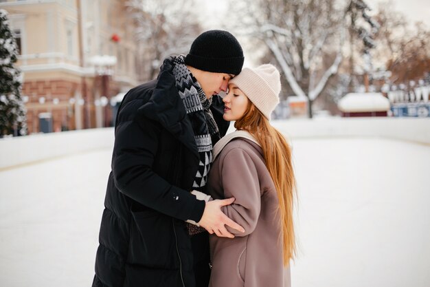 Cute couple in a ice arena