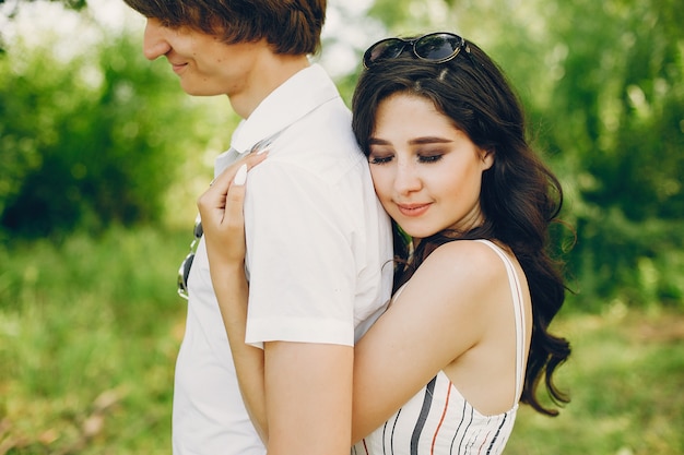 Cute couple in a summer park