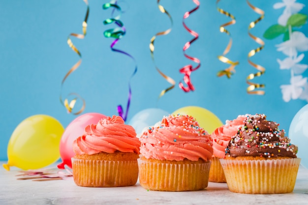 Cute cupcakes and birthday decorations