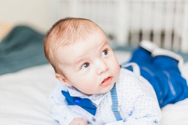 Free Photo cute and elegant baby wearing bow tie