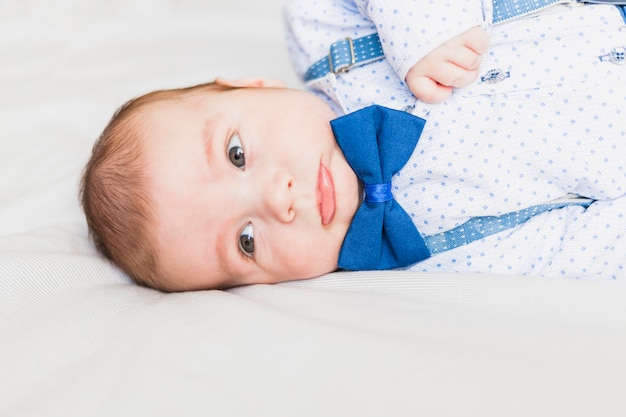 Free Photo cute and elegant baby wearing bow tie