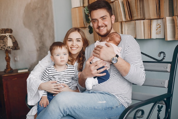 Cute familly sitting at home