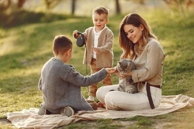 Cute family playing in a summer field