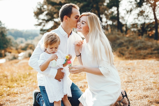 Cute family playing in a summer park