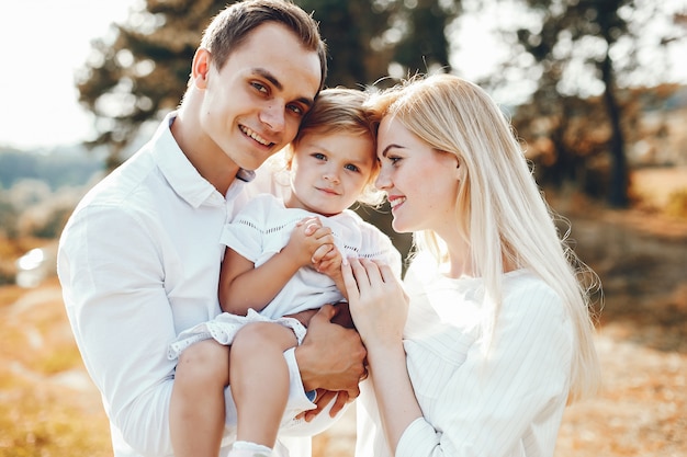 Cute family playing in a summer park