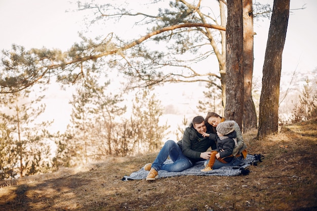 Free photo cute family playing in a summer park