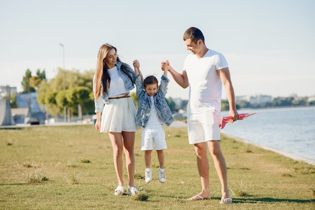 Cute family playing in a summer park