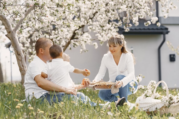 Free photo cute family playing in a summer yard