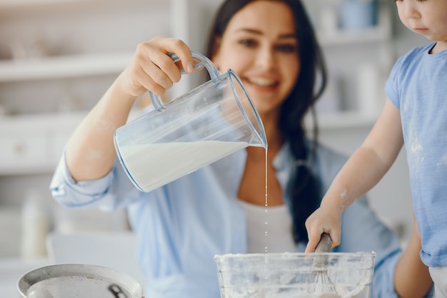 Free Photo cute family prepare the breakfest in a kitchen