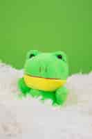 Free photo cute and fluffy frog toy