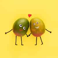 Free photo cute fruits holding hands