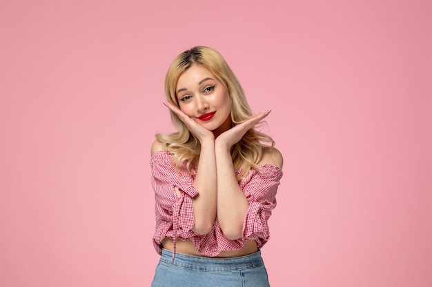 Free photo cute girl pretty blonde lady wearing red lipstick in pink shirt looking adorable