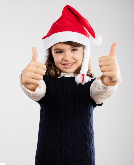 Free Photo cute girl showing thumbs up