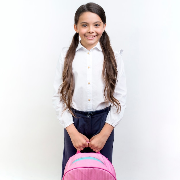 Cute girl smiling with backpack