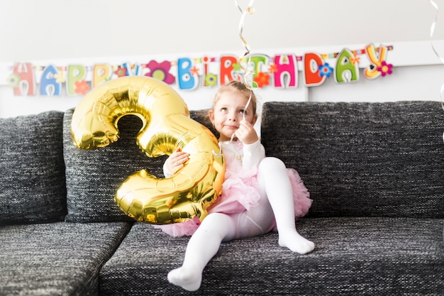 Free photo cute girl with balloon