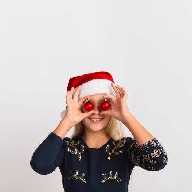 Cute girl with christmas decorations