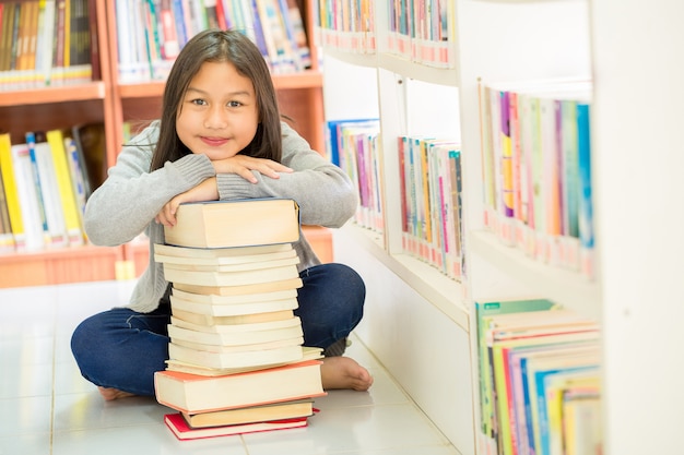 Cute girls and many books 