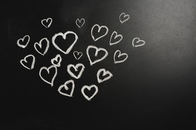 Free Photo cute hearts on blackboard