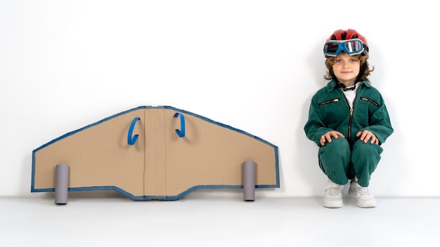 Cute kid playing with flying goggles