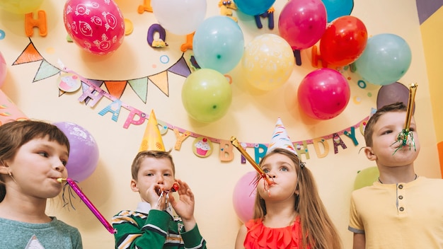 Free photo cute kids celebrating birthday