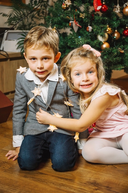 Free photo cute kids at christmas night