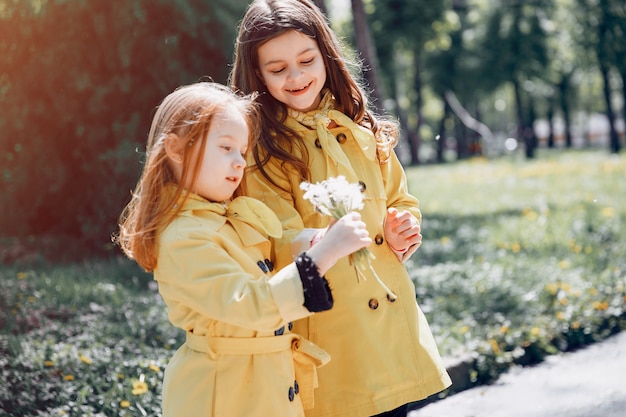 Cute kids plaiyng on a rainy day