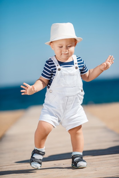 Free Photo cute little boy on the beach