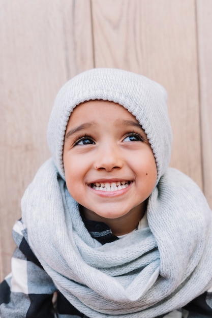 Free photo cute little boy in winter clothes