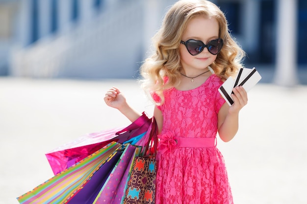 Free Photo cute little girl shopping