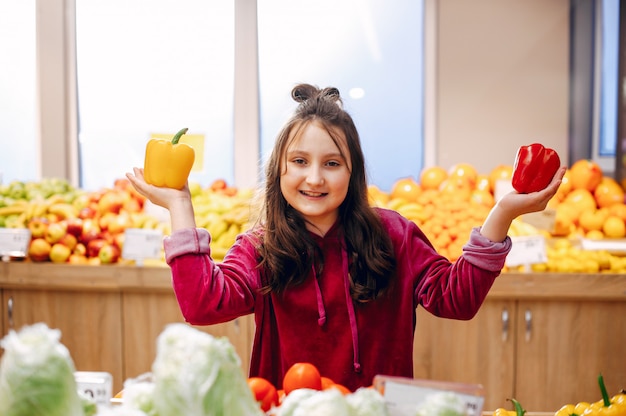 Cute little girl in a supermarket