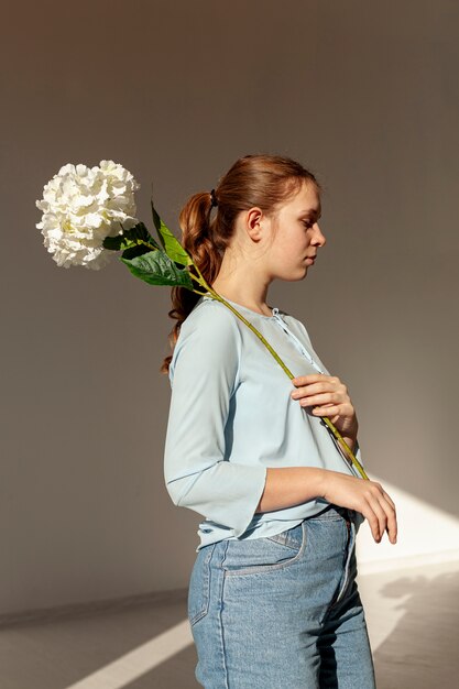 Cute model posing with flower