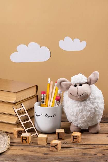 Cute plush toy and books arrangement