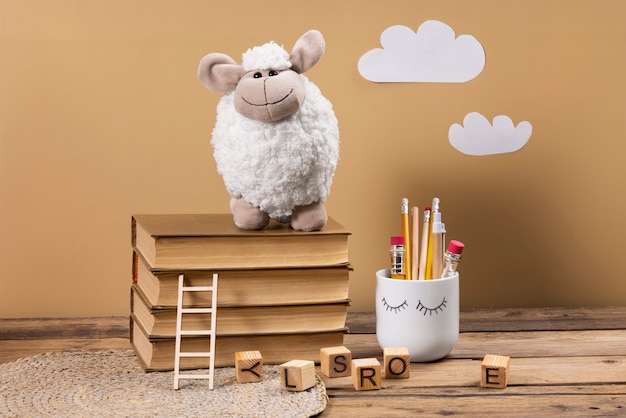 Cute plush toy and books arrangement