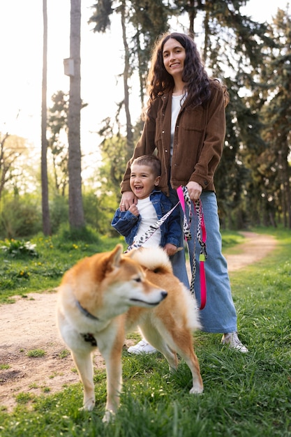 Cute shiba inu pet with family