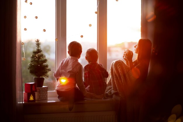 Cute siblings celebrating christmas together