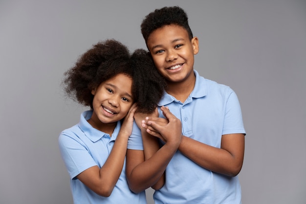 Cute siblings posing together