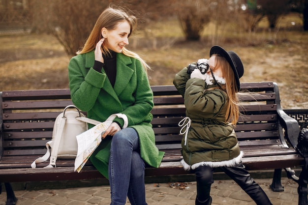 Cute and stylish family in a spring city