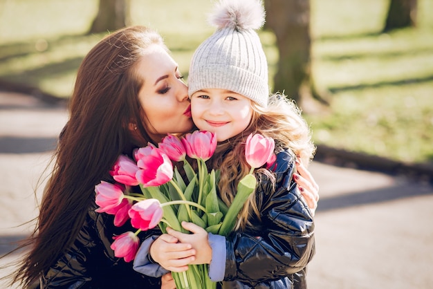 Cute and stylish family in a spring park