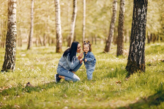 Cute and stylish family in a spring park